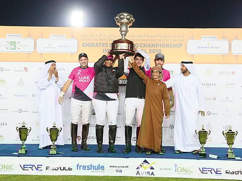 Shaikha Maitha and Shaikh Sultan Bin Falah Bin Zayed Al Nahyan celebrate the UAE Team’s victory in the Emirates Open Polo Championship 2018 final.