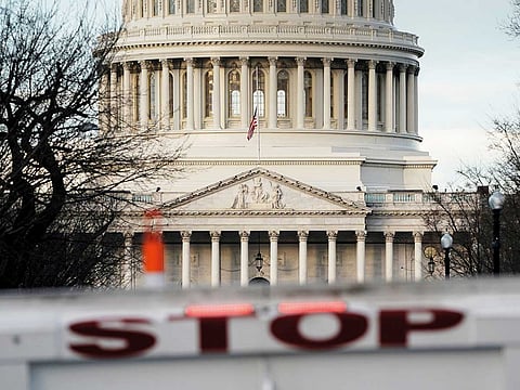 A security barricade is placed in front of the US Capitol on the first day of a partial federal government shutdown in Washington.