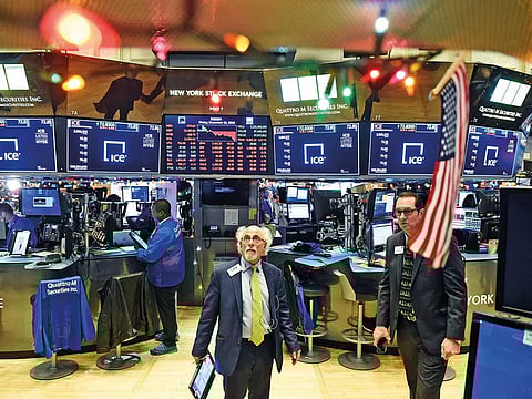 Traders at the New York Stock Exchange. This is the first time since the Second World War that the S&P 500 has had two corrections in the same calendar year.
