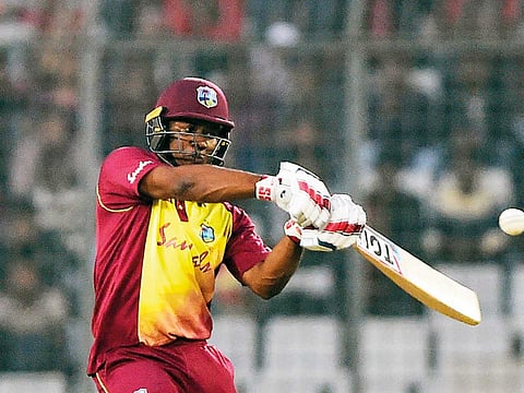 West Indies’ Evin Lewis looks in an aggressive mood during his quickfire 89 in the third Twenty20 match against Bangladesh at the Sher-e-Bangla National Cricket Stadium.