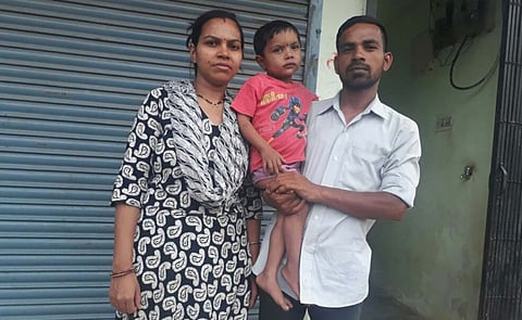 Priyanshu (middle) along with his father, Sagar, and mother in Pune, India. 