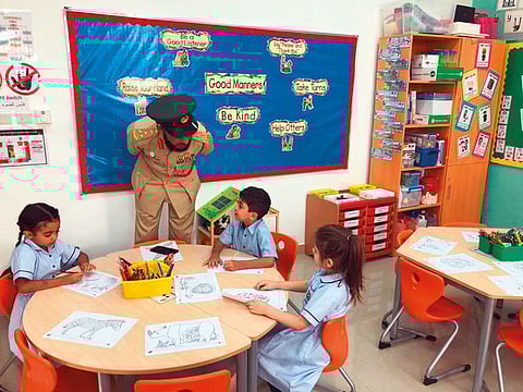 Schools security imitative , Police official at a classroom on the first day of school.