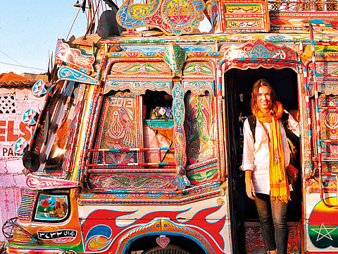 Eva Zu Beck in a vehicle decorated with Pakistan's 'truck art'