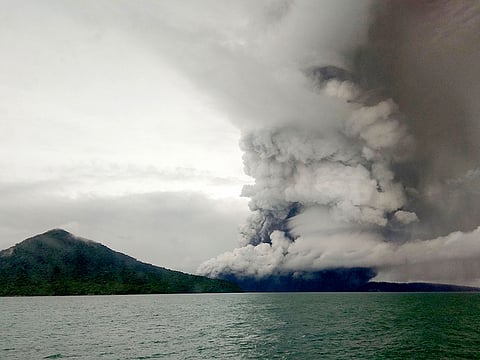 This picture taken on December 26, 2018 shows the Anak (Child) Krakatoa volcano erupting, as seen from a ship on the Sunda Straits.