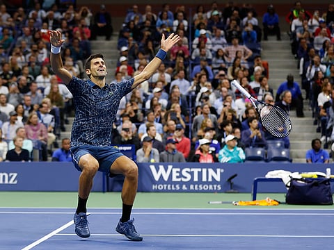 Novak Djokovic, of Serbia, celebrates after defeating Juan Martin del Potro, of Argentina, during the men's final of the U.S. Open tennis tournament on Sept. 9, 2018, in New York.