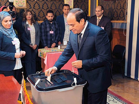 Al Sissi re-elected president: Egyptian President Abdul Fattah Al Sissi casts his ballot. Al Sissi won a second presidential term in elections held between March 26 and 28. 