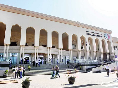 The main facade of Dubai Courts building.