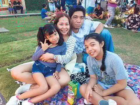 Supplied Sharon Labaste-Belen with her husband VG, and daughters  Eunice Veronica, 10, and Aiesha Avril, 6.