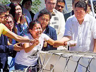 Family grieves Philippine maid found dead in Kuwait freezer