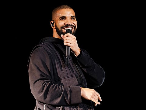 Drake touts giveaways, urges fans to do the same