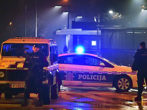 Police block off the area around the U.S. Embassy in Montenegro's capital Podgorica, Thursday, Feb. 22, 2018.