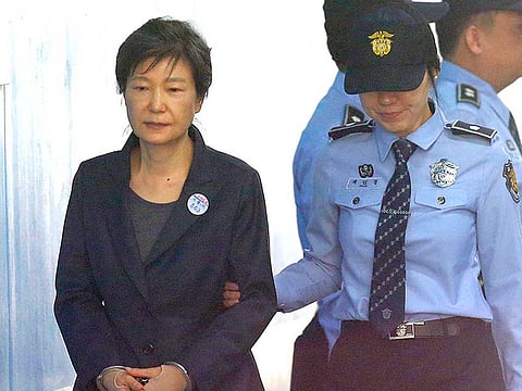 File picture: Former South Korean President Park Geun-hye, left, arrives to attend a hearing on the extension of her detention at the Seoul Central District Court in Seoul, South Korea.