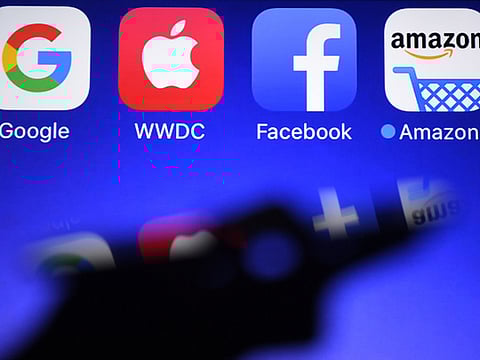 The connectivity bandwagon needs to make a move on homes. Even now, most devices operate in standalone format, and that's what Internet of Things will need to change. File picture shows a smartphone being operated in front of GAFA logos (acronym for Google, Apple, Facebook and Amazon).