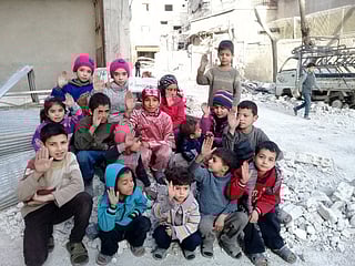 In Ghouta, Syrian children and adults say #IAmStillAlive