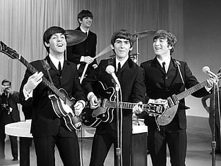 Unseen photos of Beatles fetch Dh1.3m at auction