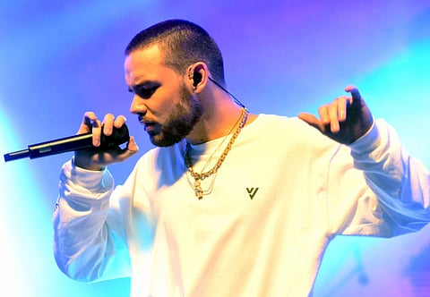 Pop star Liam Payne performs at Global Village.