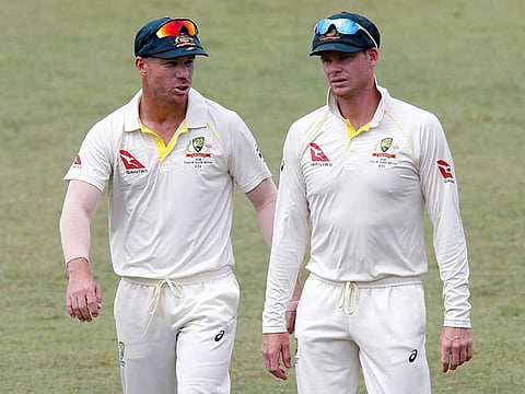 David Warner (left) and Steve Smith. 