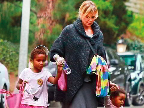 Charlize Theron considered leaving US over racism