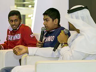 Pakistan teen brothers inspire children at reading fest