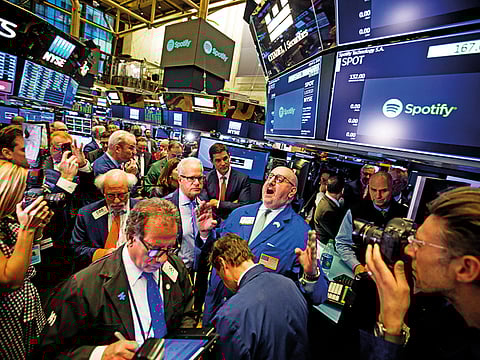 Wall Street ended sharply higher on Tuesday, bouncing back from a multi-day losing streak as a string of upbeat earnings reports and revived economic optimism.