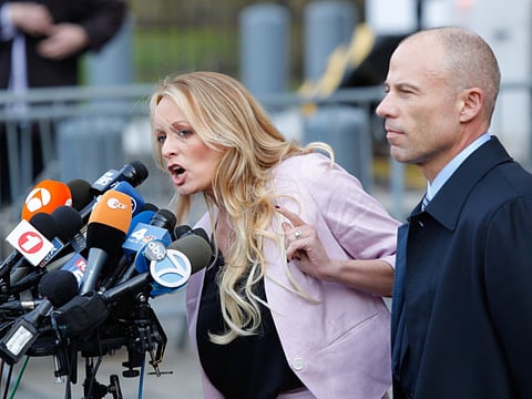 Adult film actress Stephanie Clifford with her lawyer Michael Avenatti (right). 
