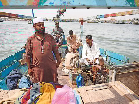 Pakistani fishermen in a file photo. Their demands included expulsion of large fishing trawlers encroaching on their livelihood and provision of health facilities, drinking water, schools and basic infrastructure.