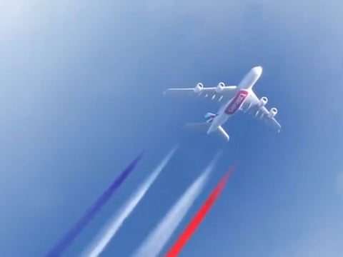 Picture for illustrative purposes: An Emirates A380 aircraft paints the skies with the colours of the French flag in celebration of World Cup victory.