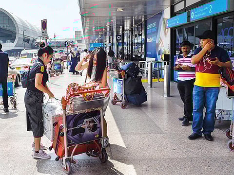 People seen at Dubai International Airport departures, Terminal 1.