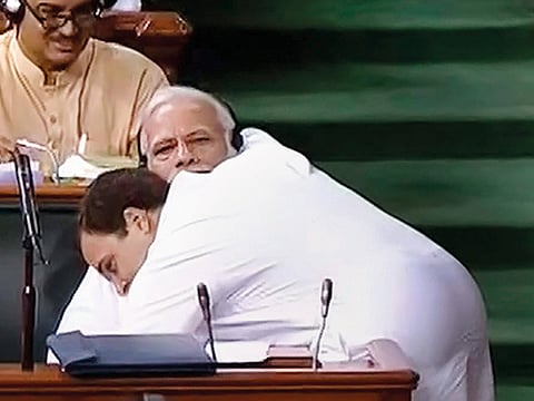 
Congress president Rahul Gandhi hugs Prime Minister Narendra Modi after his speech in the Lok Sabha on the no-confidence motion on Friday.