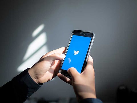 The Twitter logo is displayed on an Apple iPhone in this arranged photograph taken in the Brooklyn borough of New York on April 23, 2018. MUST CREDIT: Alex Flynn/Bloomberg