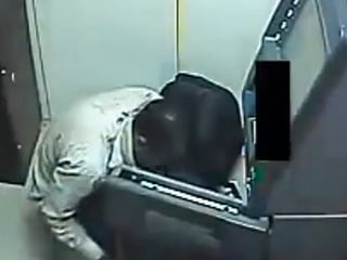 Robbers walk away with ATM machine in Bihar, India