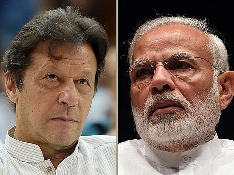 Pakistani PM Minister Imran Khan (left) wrote a letter to his Indian counterpart Narendra Modi offering dialogue.