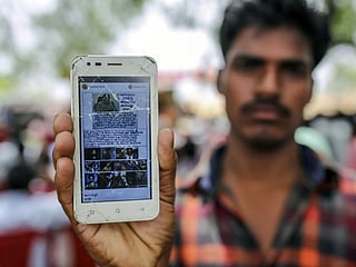 Explainer: How false WhatsApp messages led to mob killings in India