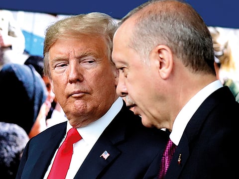 Donald Trump talks to Recep Tayyip Erdogan.