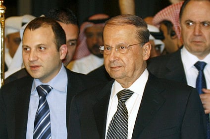 File picture shows Lebanese Christian politician Gebran Bassil (left) with his father-in-law Michel Aoun (centre).