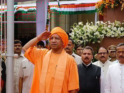 Uttar Pradesh state Chief Minister Yogi Adityanath salutes during Independence Day celebrations in Lucknow, India.