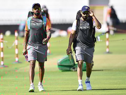 Lokesh Rahul (left) with Indian captain Virat Kohli at a practice session during the 2019 ICC World Cup. 