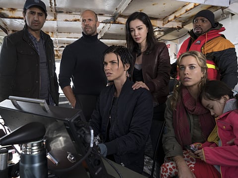 Cliff Curtis, Jason Statham, Ruby Rose, Li Bingbing, Page Kennedy, Jessica McNamee and Shuya Sophia Cai in ‘The Meg’.