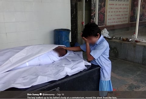 Photo of Indian boy sobbing on father’s body raises Rs5.2 million