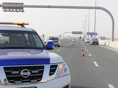 Abu Dhabi police blocking a section of a road. Photo for illustrative purposes only
