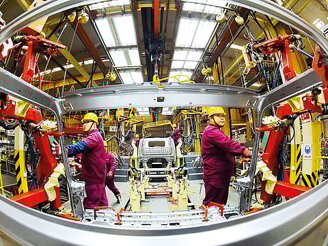 An auto production line in Weifang, Shandong province, China. The country’s Caixin/IHS Markit PMI slipped into contraction territory for the first time in 19 months.