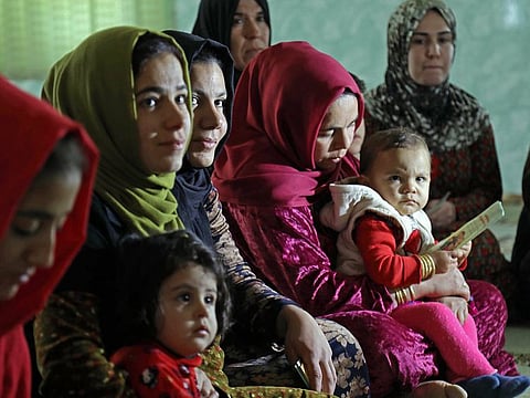Women and young girls listen to Rasul, female genital mutilation appears to have been practiced for decades in Iraq's Kurdish region, usually known for more progressive stances on women's rights. 