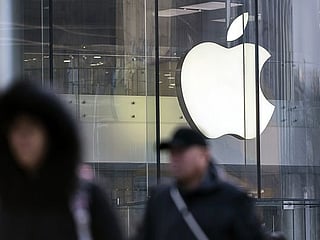 Slow iPhone sales prompt Apple to cut revenue outlook