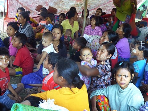 Myanmar people displaced from the recent fighting between government troops and ethnic Arakan Army take shelter at a displacement camp housing over 700 people in Kyauktaw township in Rakhine state on December 23, 2018.