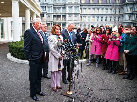 New House Speaker Nancy Pelosi, a Democrat from California, speaks while (from left) House Minority Whip Steny Hoyer, Senate Minority Whip Dick Durbin and Senate Minority Leader Chuck Schumer listen during a conference after a meeting at the White House.