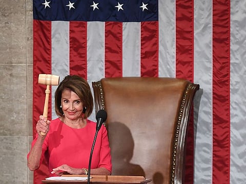  New Speaker of the US House of Representatives Nancy Pelosi, D-CA, holds the gavel during the opening session of the 116th Congress at the US Capitol in Washington, DC.