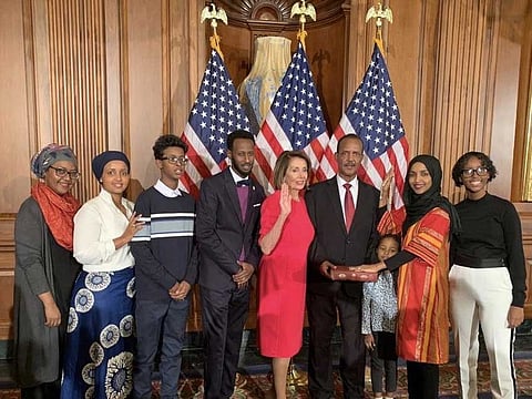 Muslim Congresswoman Ilhan Omar made history by wearing hijab on the floor of the House of Representatives as rules are changed to allow religious head coverings — then sworn in on the Quran.