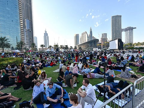 People gather at the Burj Park in Dubai. The UAE has been included in the Index as a non-OECD country for the first time since the index's creation.