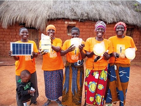 Women from Maduma village in Tanzania supported by Solar Sister. The group has directly supported women in poor countries to create over 3,500 sustainable businesses that provide clean energy to over 1.5 million people in Uganda, Nigeria and Tanzania.