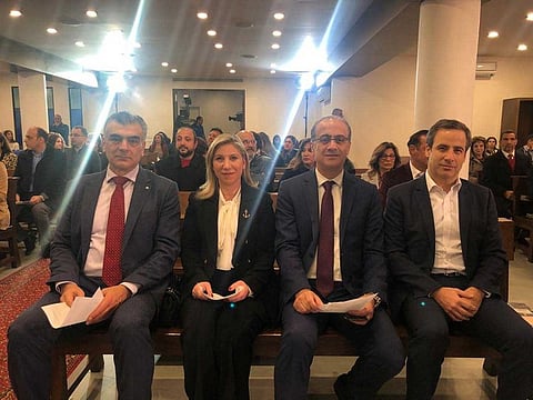 Rola Tabsh, a member of PM-designate Sa’ad Hariri’s party, joining the “peace and love” mass held on January 1 in Antelias, a town north of Beirut. 